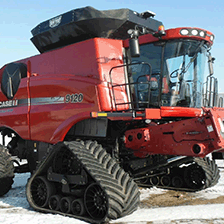 A photo of a red combine